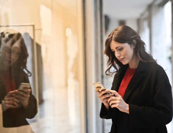 close-up-photo-of-woman-in-black-coat-using-smartphone-787929-scaled-1